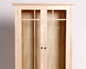 Contemporary dresser with glazed doors.